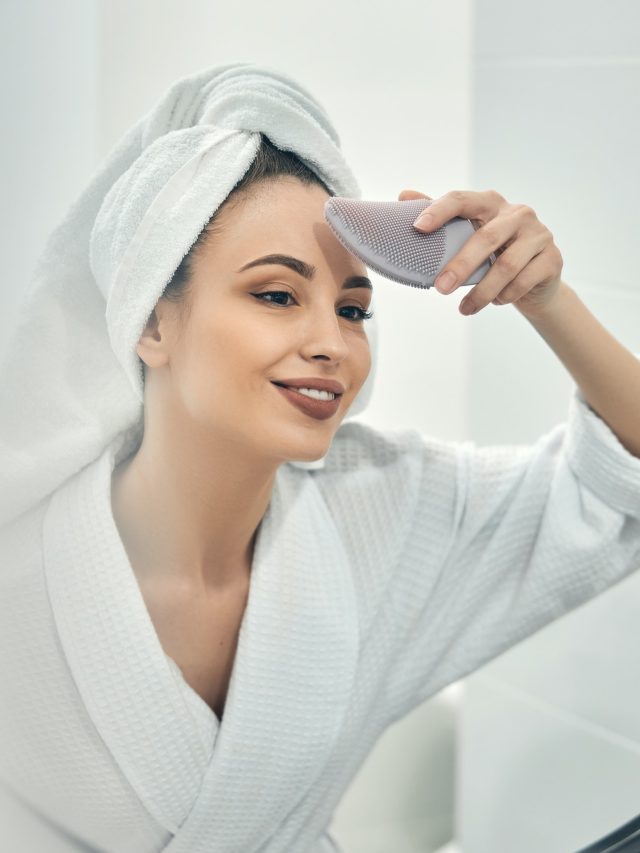 cropped-happy-lady-taking-care-of-her-facial-beauty-at-home.jpg