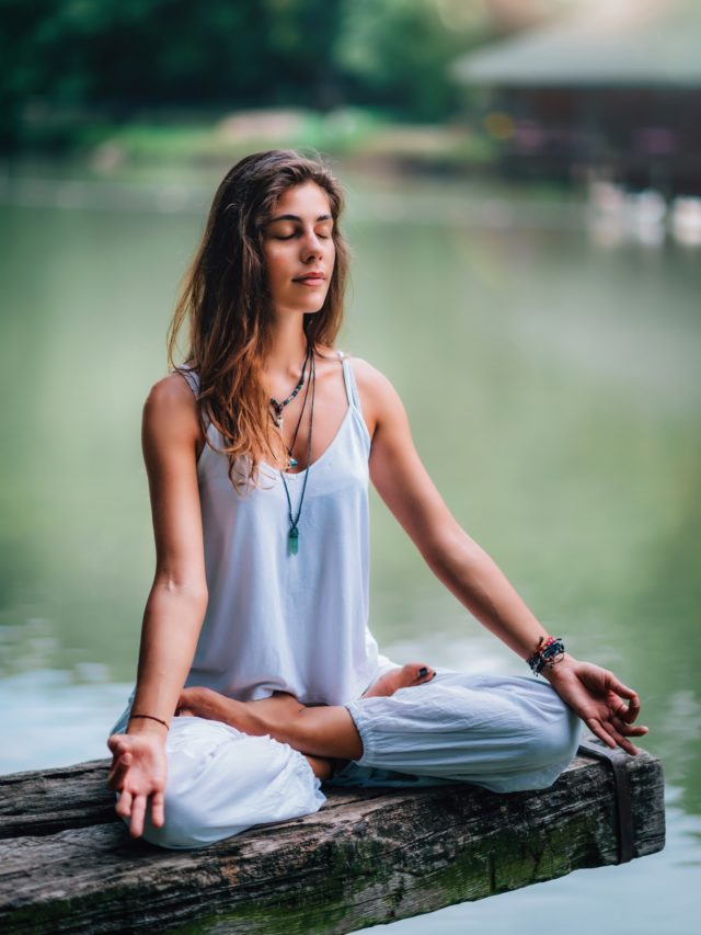 cropped-woman-meditating-by-the-lake.jpg